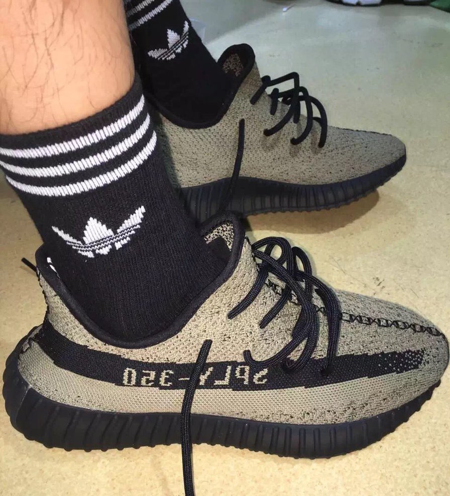 The NEW Adidas YEEZY BOOST 350 v2 Black White add to sneaker