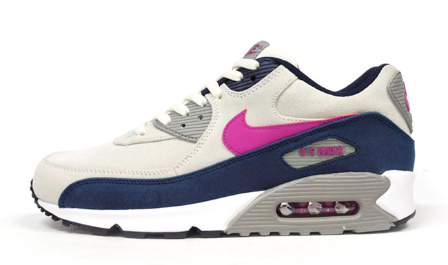 Pink and navy hot sale nike shoes