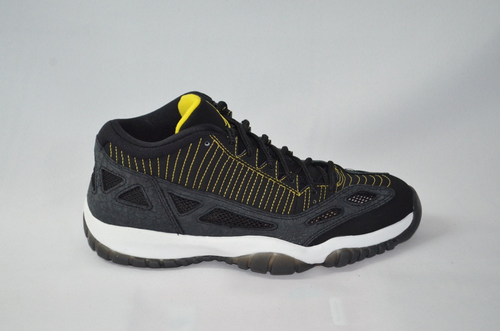 jordan 11 black yellow