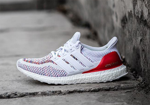white adidas ultra boost with rainbow