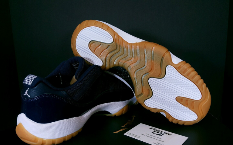 jordan 11 low navy gum on feet