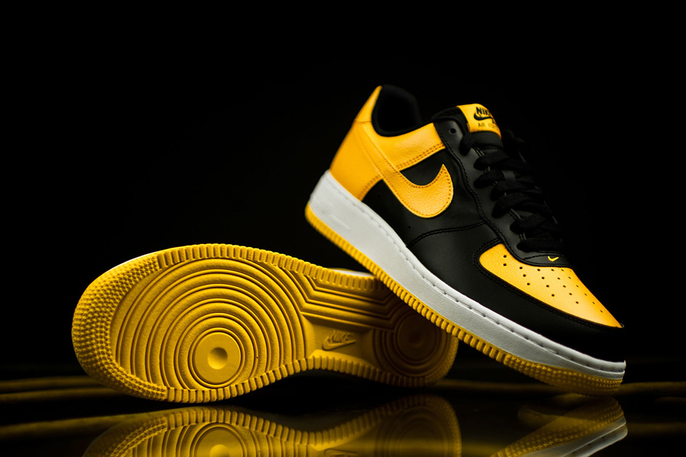 black white and yellow air force ones