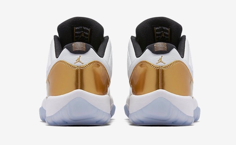 white and gold low top 11s
