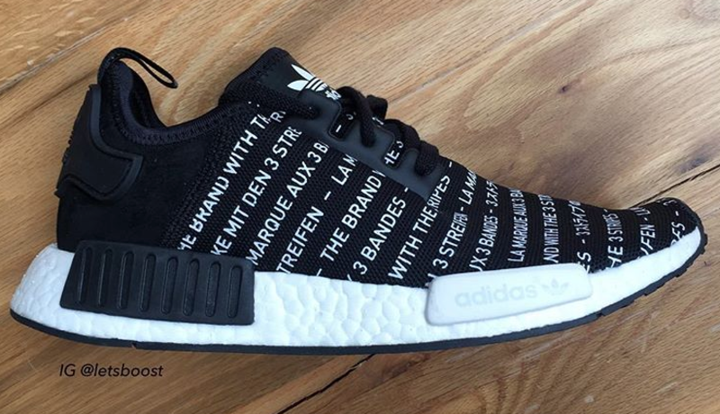 nmd black with writing