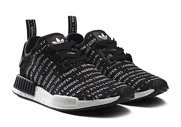 nmd black with white writing