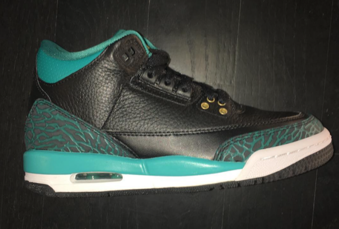 grey and teal jordan 4