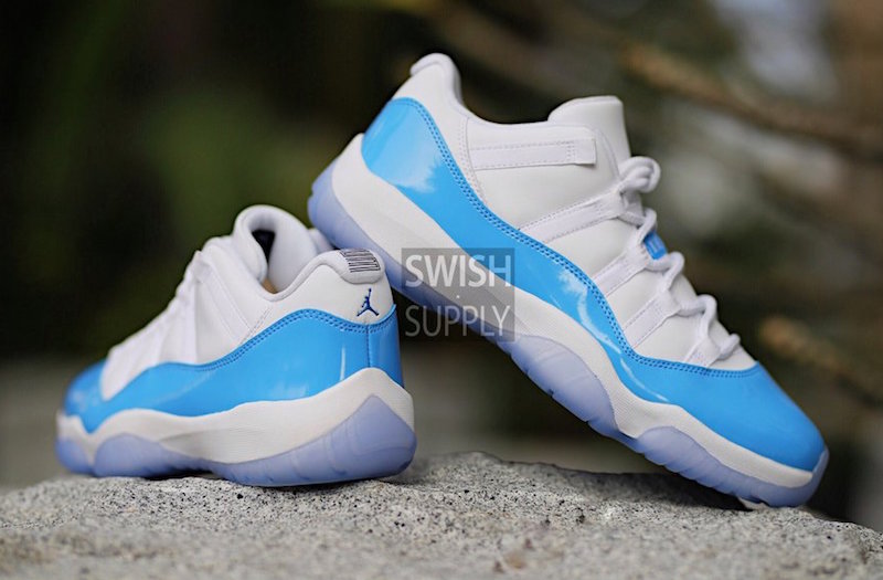 blue and white low top 11s