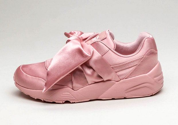 pink puma sneakers with bow