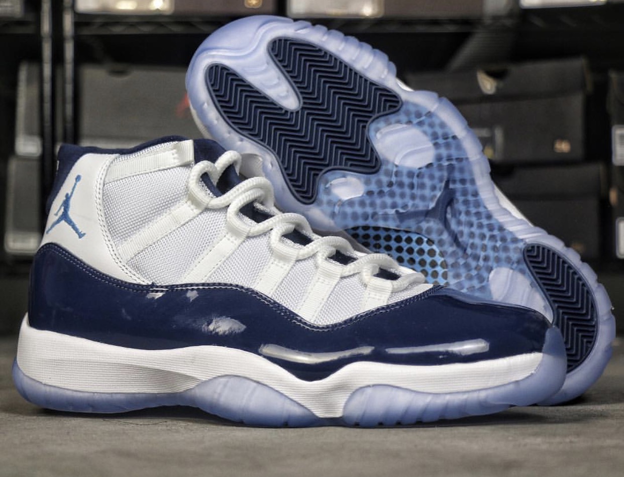 white and navy jordan 11