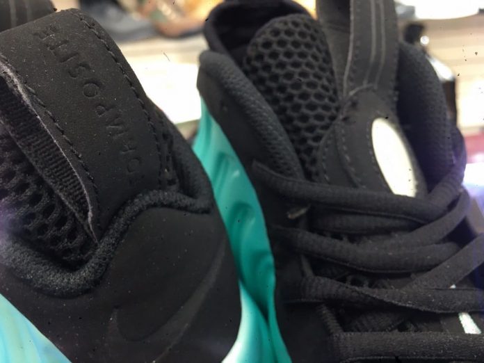 foamposite island green on feet