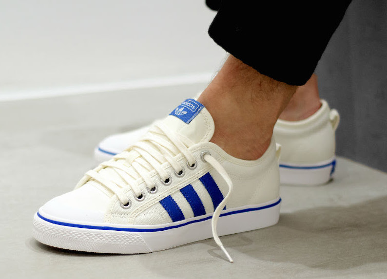 adidas originals nizza canvas trainers in white and blue