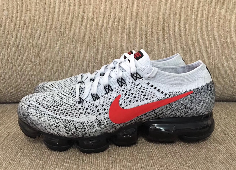 grey and red nike vapormax