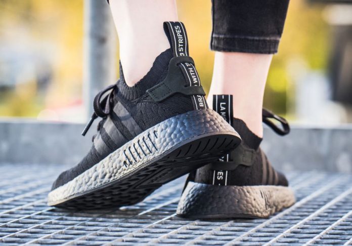 nmd r2 primeknit triple black