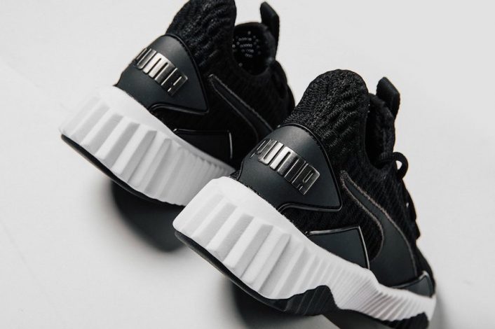 puma defy mid varsity white