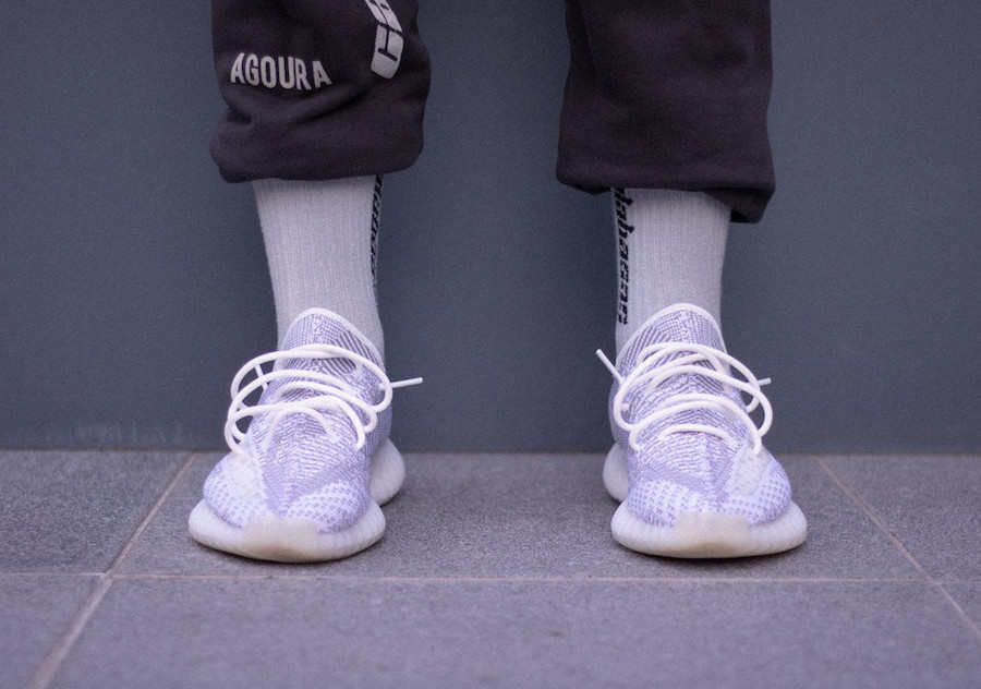 yeezy static reflective on feet