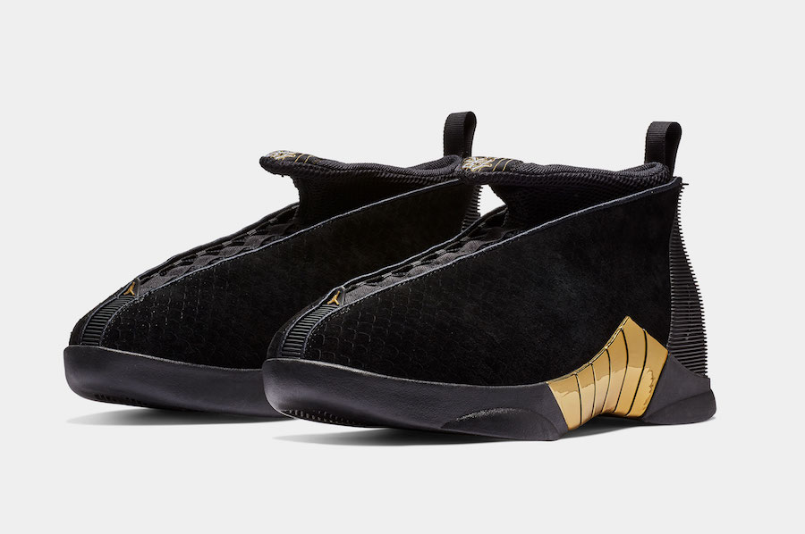 black and gold jordan 15s