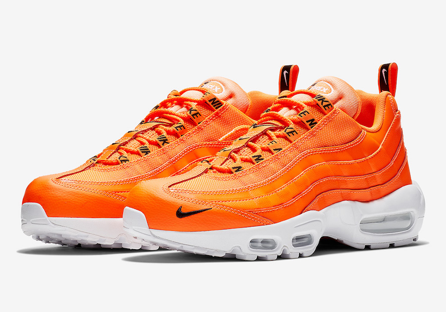 white and orange air max 95