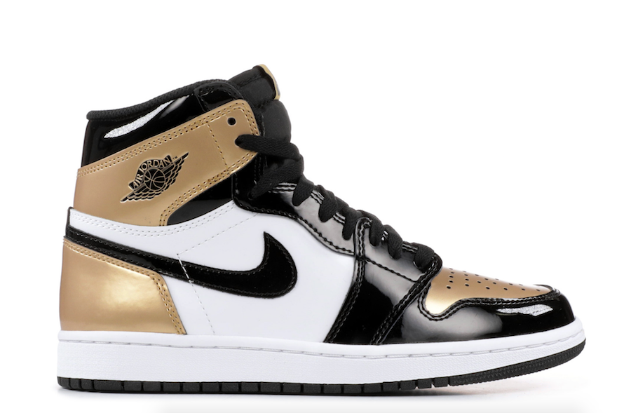 black and gold and white jordans