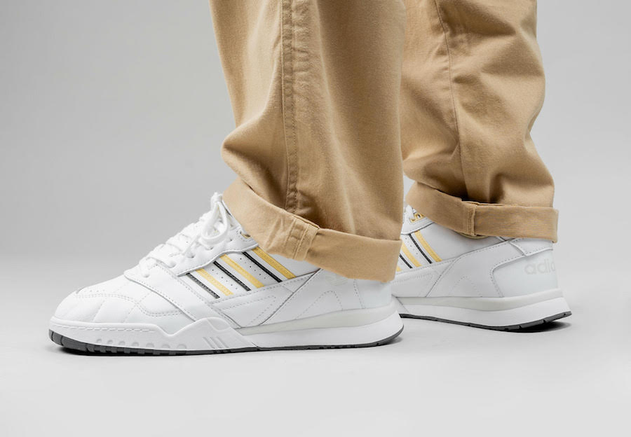 adidas white and yellow trainers