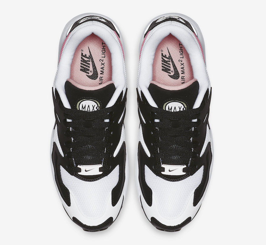 white black and pink nikes