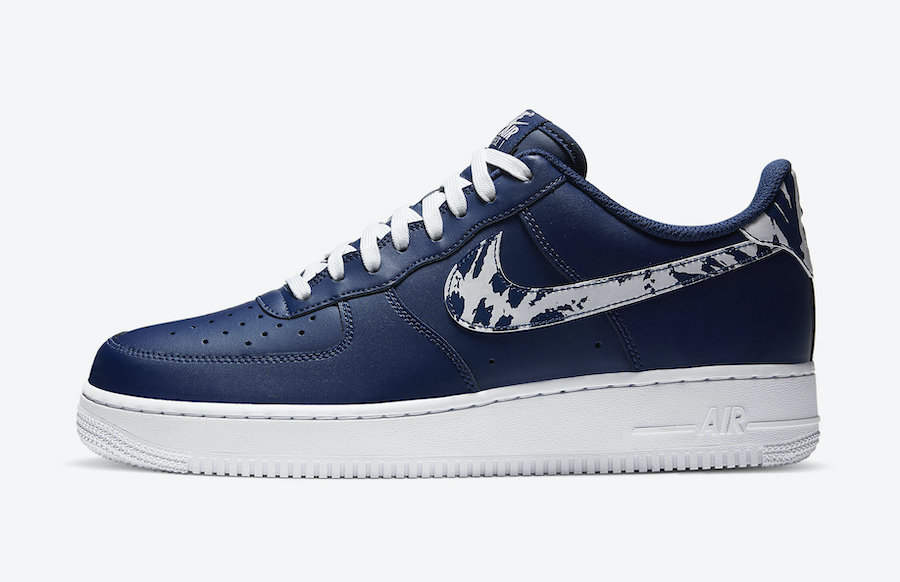 navy blue and white air forces