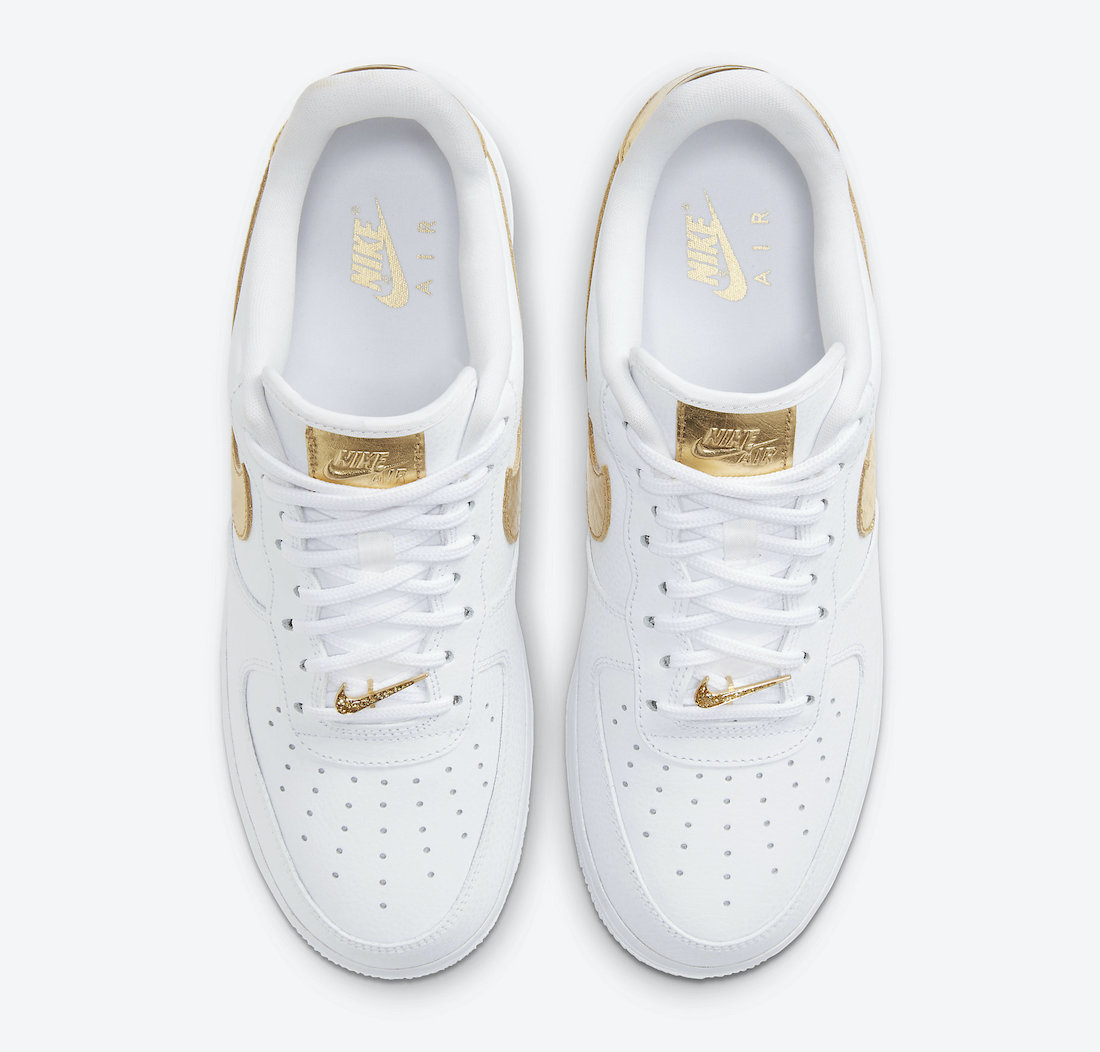 white and gold nike air forces