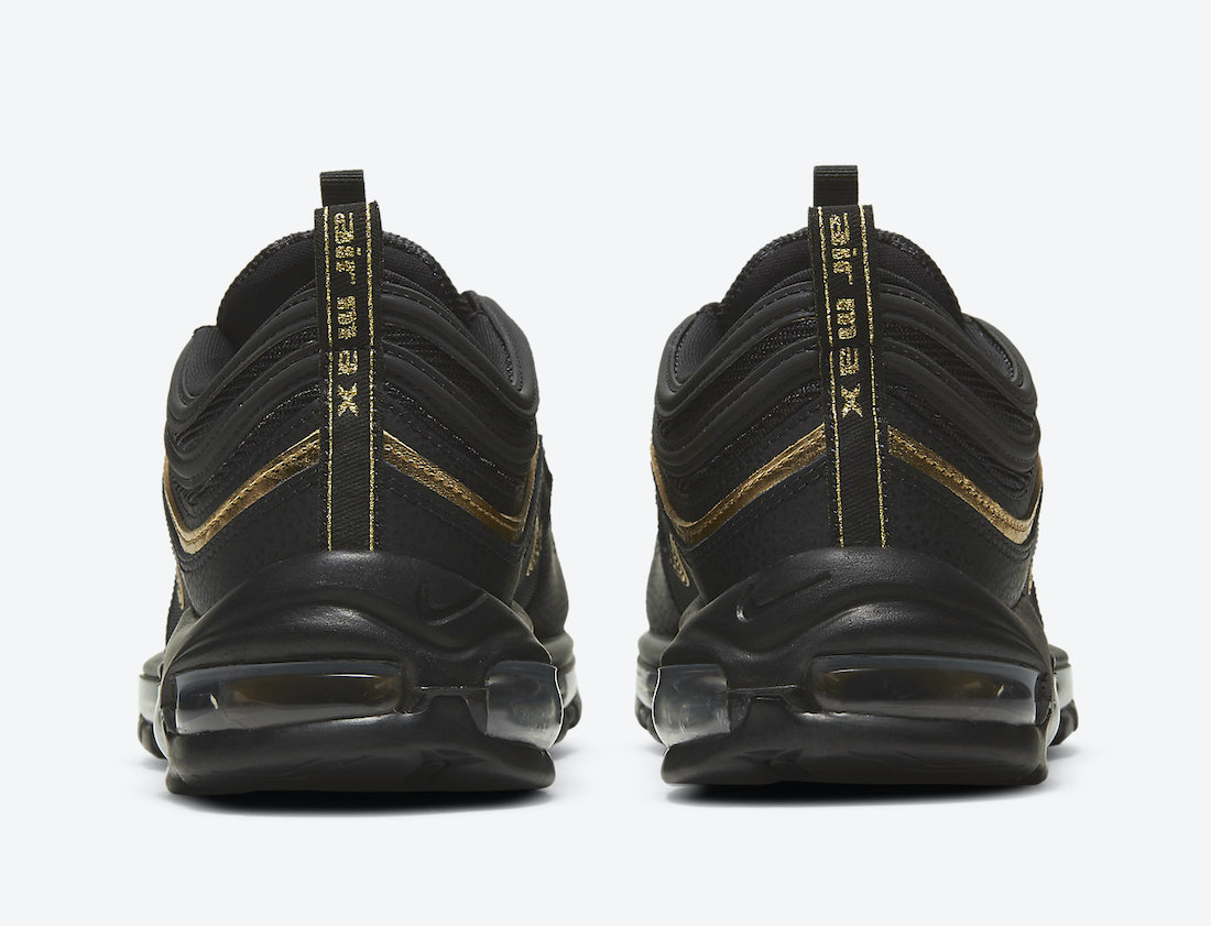 black air max with gold tick