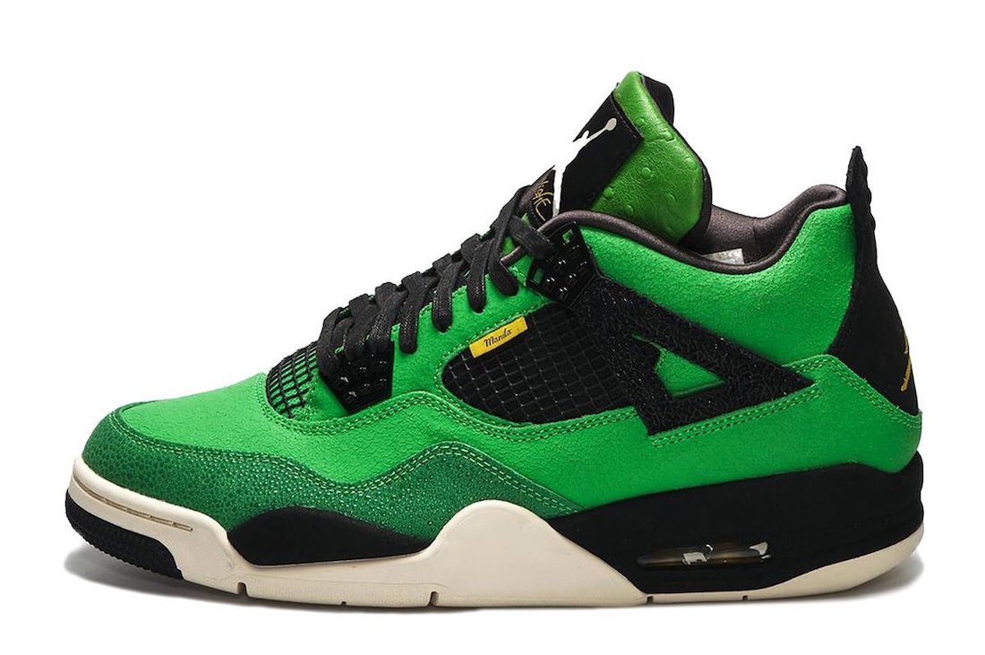 black and green jordan 4