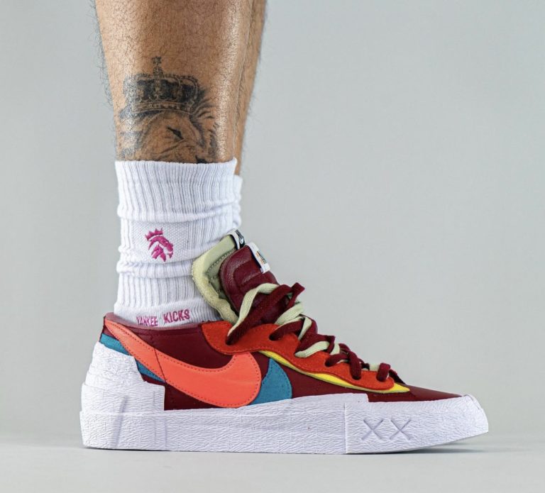 sacai kaws blazer low release date