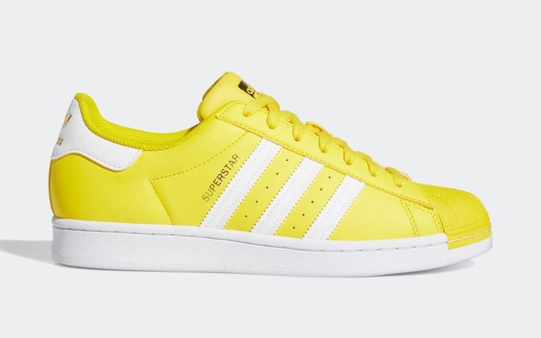 yellow adidas superstars