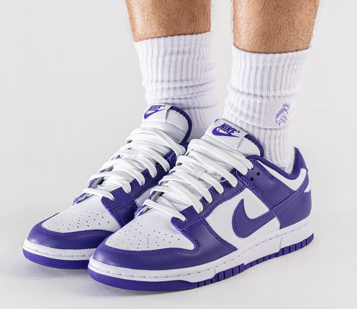 white and purple dunks