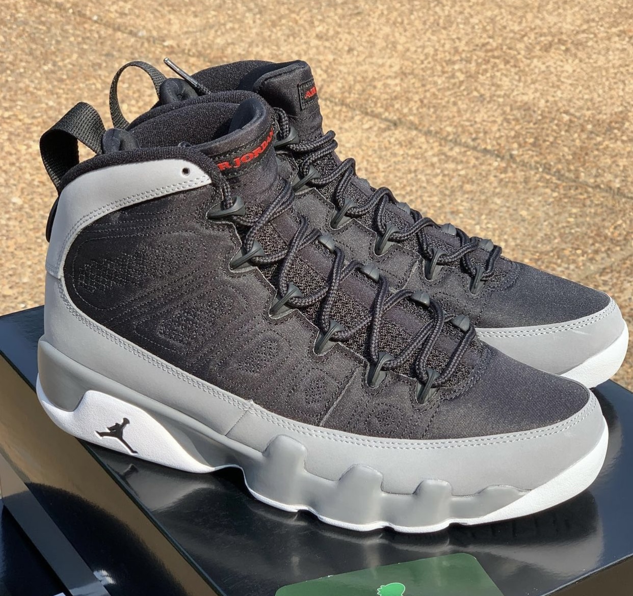 grey and black jordan 9s