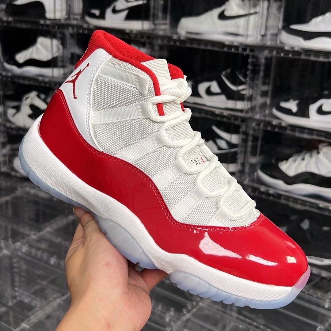 grey and red jordan 11