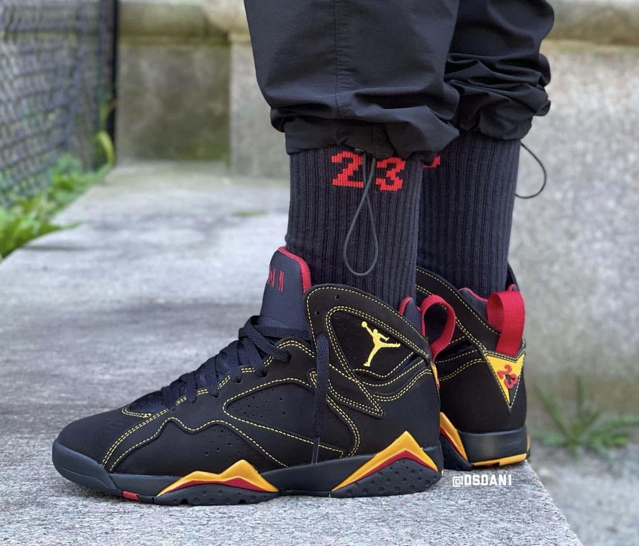 black and orange jordan 7