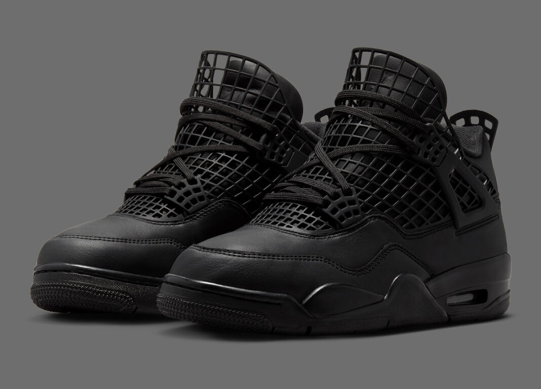 Close-up view of the Air Jordan 4 NET Black colorway showcasing the unique black leather and grid mesh overlay design.