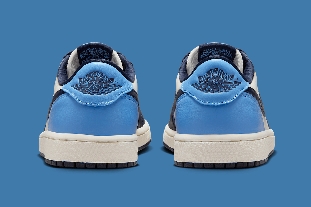 Rear view of the Air Jordan 1 Low OG 'Obsidian' featuring a university blue heel panel with the iconic Air Jordan Wings logo embossed.