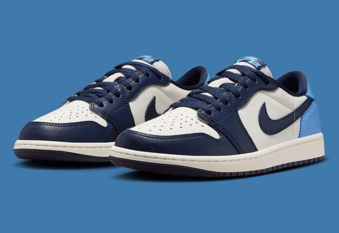Air Jordan 1 Low OG 'Obsidian' featuring a premium leather upper in sail, obsidian, and university blue with a classic low-top silhouette.