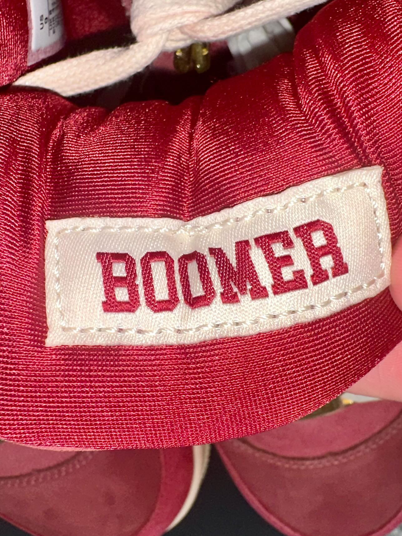 Inner tongue details of the Air Jordan 4 Oklahoma Sooners PE displaying Boomer embroidery