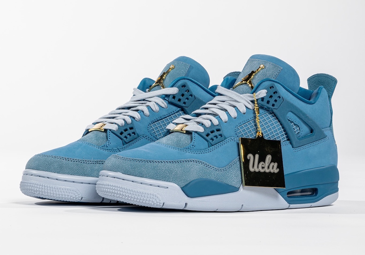 A close-up of the Air Jordan 4 UCLA Bruins PE featuring a light blue suede upper and gold Jumpman branding.