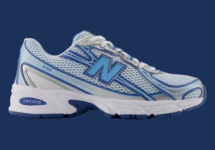 Side profile of the New Balance 740 Blue Agate showcasing mesh upper and silver overlays