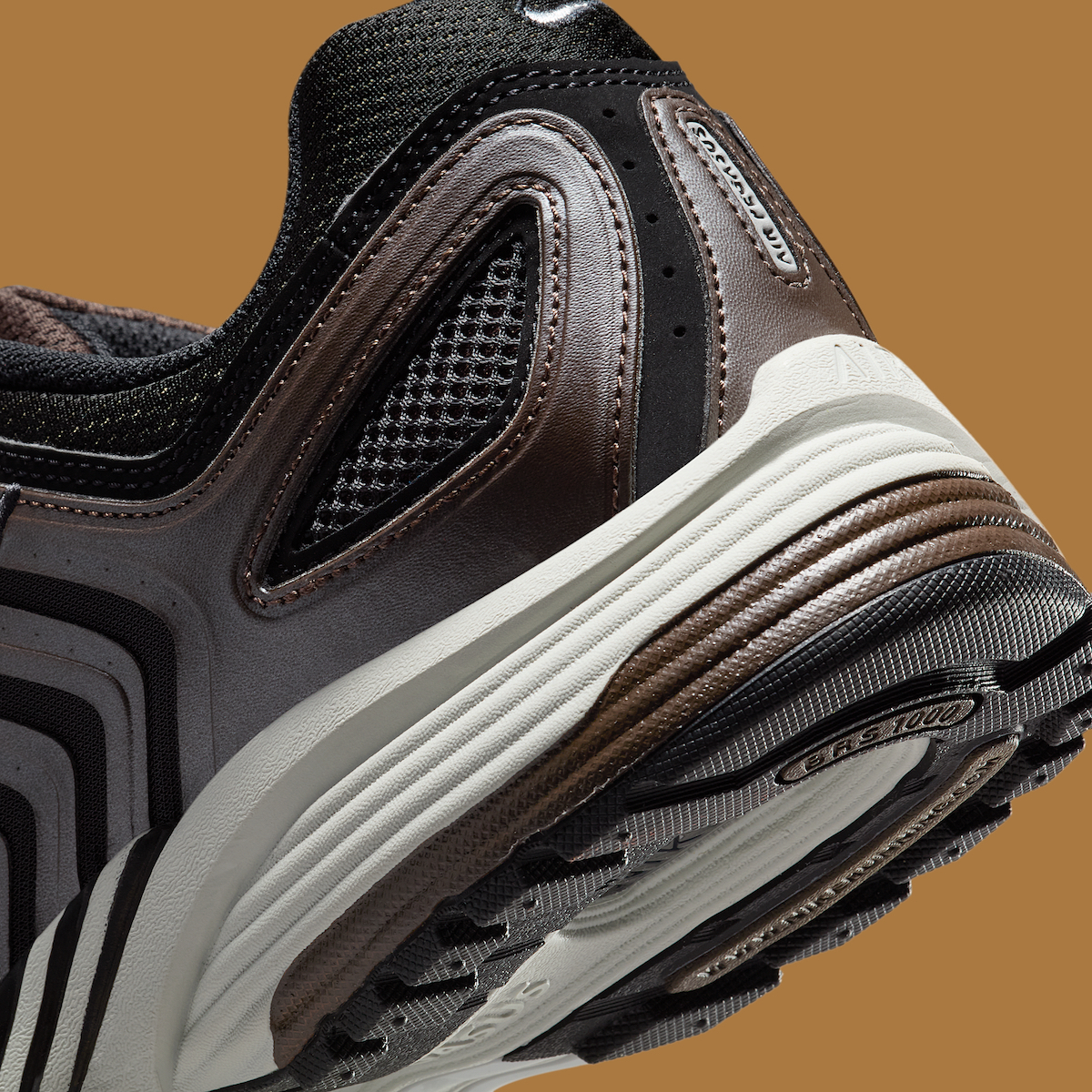 Detail shot of the heel area on the Nike Air Pegasus 2K5 "Baroque Brown" with bronze accents.