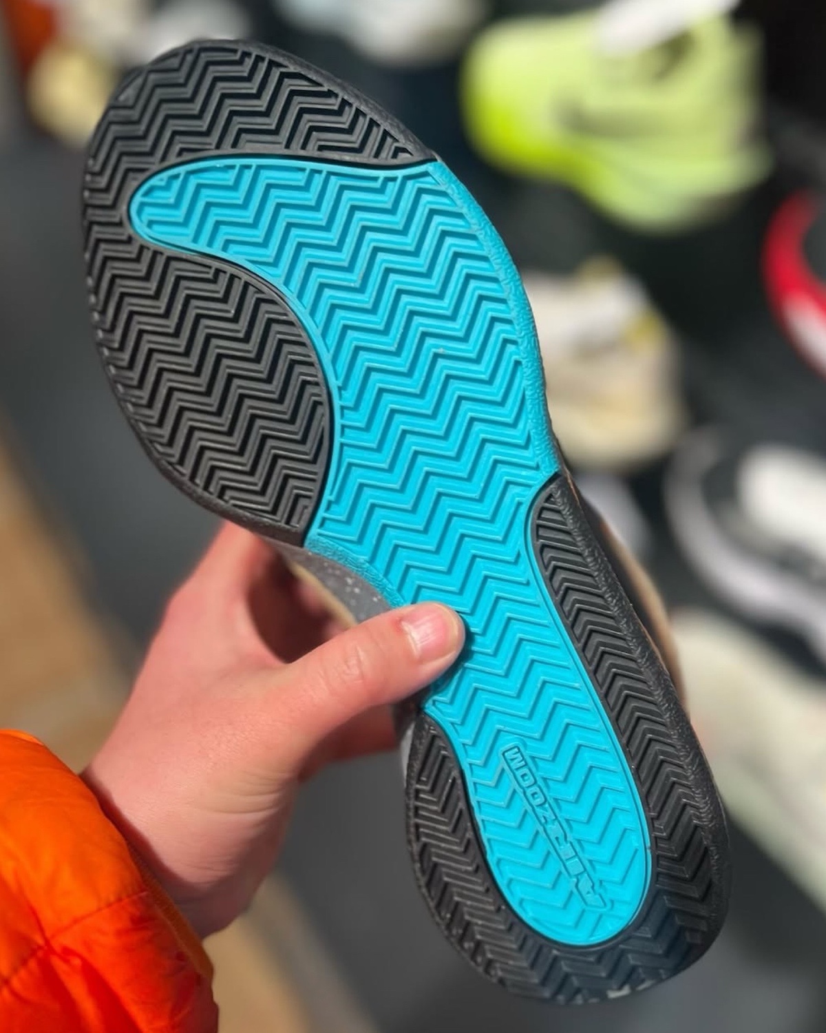 Nike Book 1 Mowabb IF2406-200 outsole featuring a dual-tone black and blue traction pattern for enhanced grip and durability