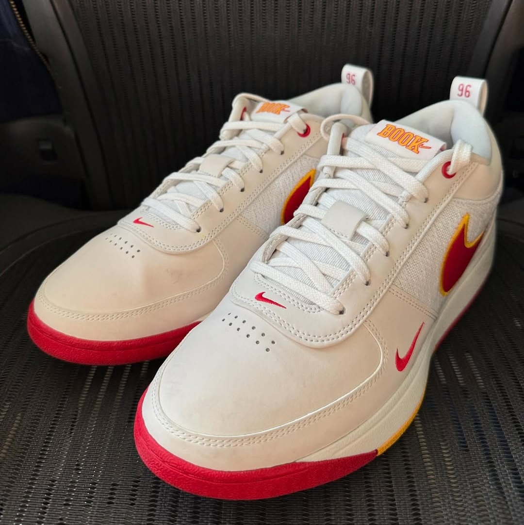 Nike Book 1 "USC Home" PE in-hand with "BOOK" branding on tongue.
