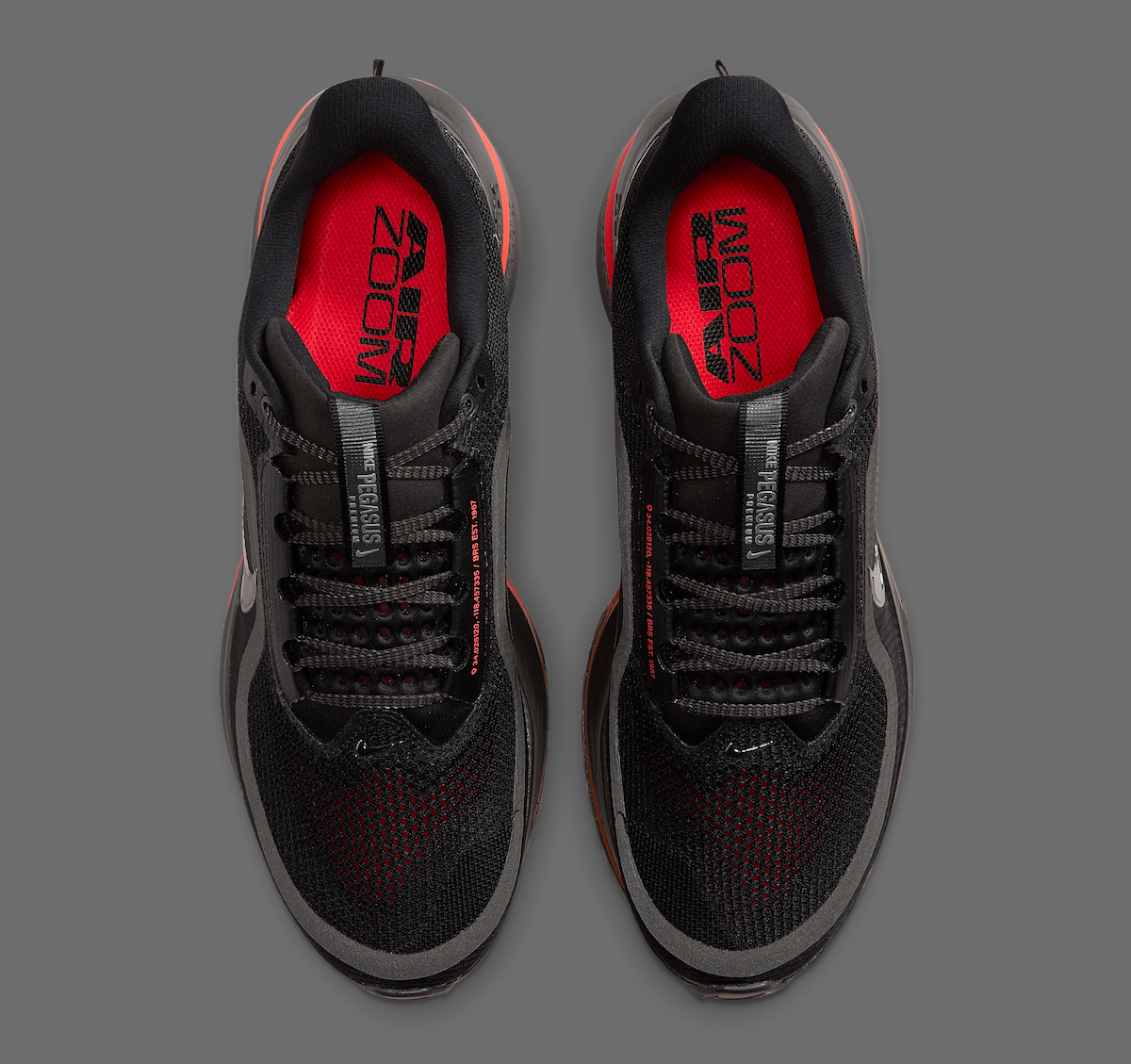 Top-down view of Nike Pegasus Premium Black Bright Crimson showing breathable mesh upper and tongue details