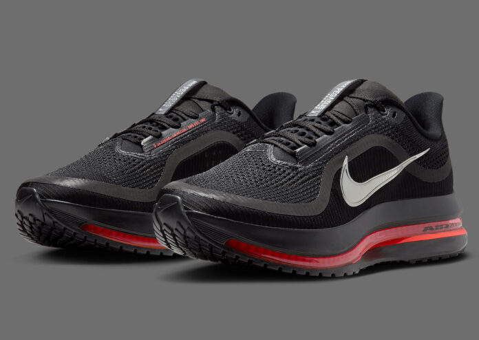 Nike Pegasus Premium Black Bright Crimson angled view showcasing black upper, silver Swoosh, and crimson accents
