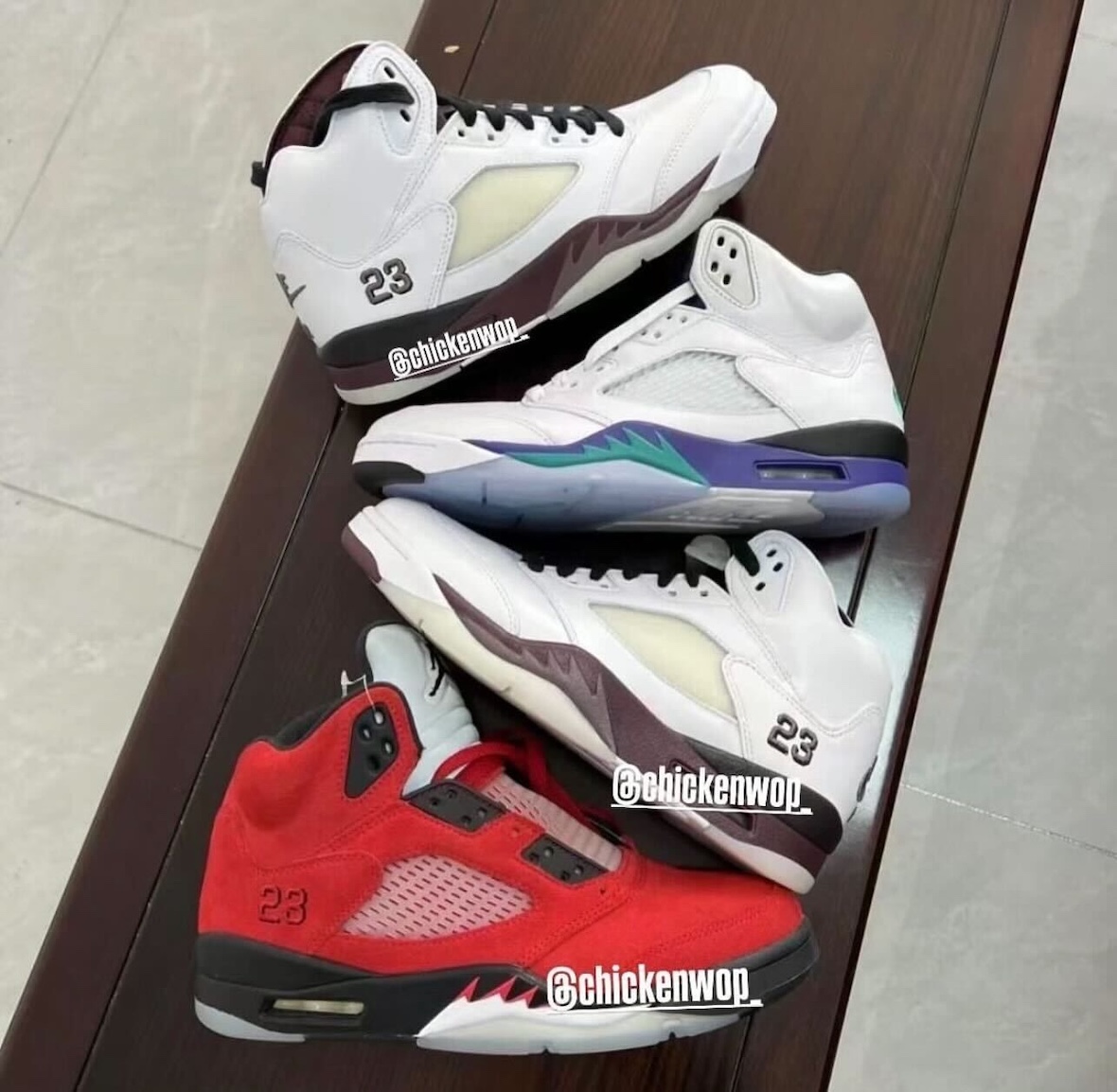 A side-by-side look at the upcoming A Ma Maniére x Air Jordan 5 collaboration, featuring the Violet Ore Burgundy Crush colorway. The sneakers are displayed alongside other Air Jordan 5 models for comparison.