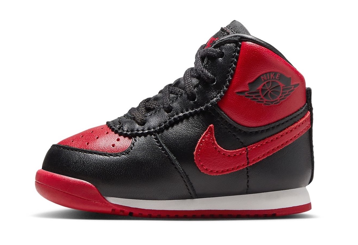 Air Jordan 1 High 85 Bred Toddler DV3655-067 with black and red leather upper, iconic Swoosh, and classic Wings logo.