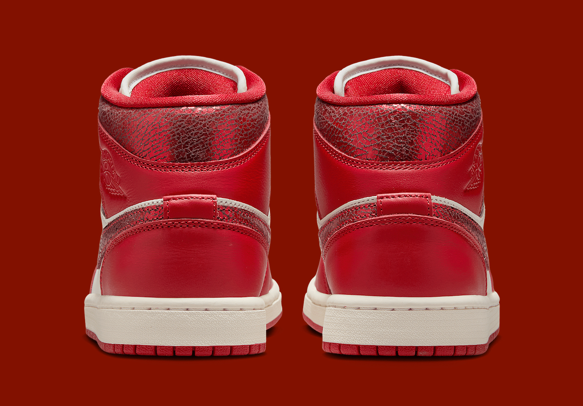 Rear view of the Air Jordan 1 Mid featuring cracked leather on the heel collar.