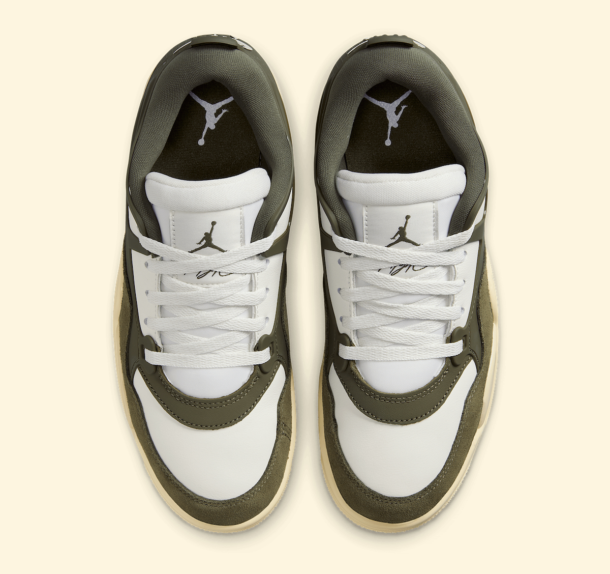 Top-down view of Air Jordan 4 RM Medium Olive emphasizing white laces and Jumpman logo on the tongue.