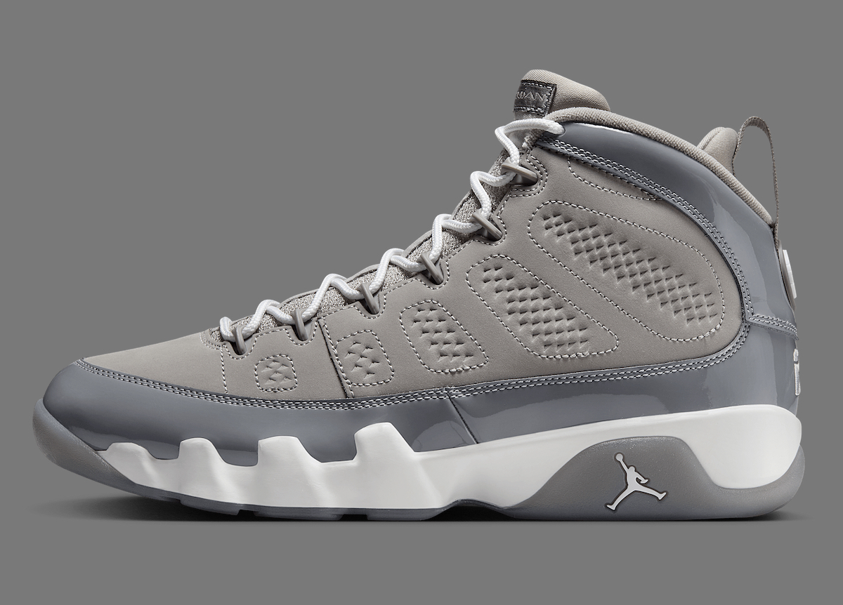 Side profile of the Air Jordan 9 'Cool Grey' HV4794-011 showcasing its sleek grey upper, patent leather overlays, white laces, and signature Jumpman branding on the midsole.